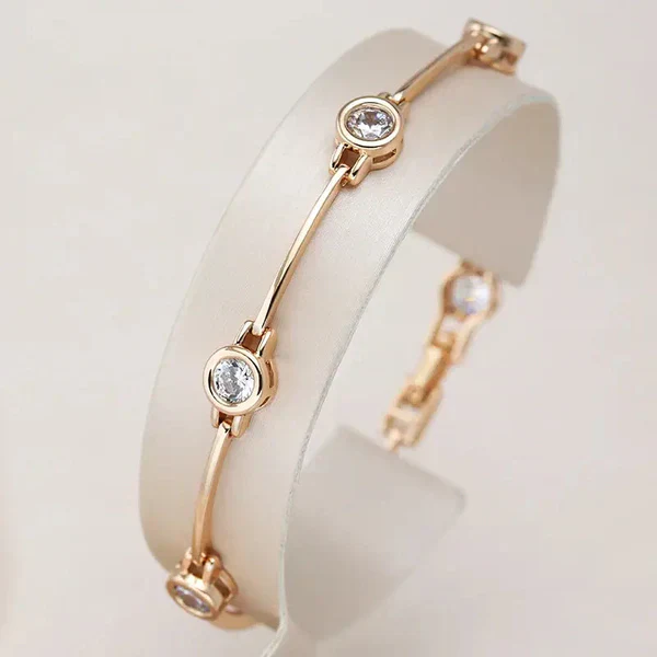 1+1 Offer: Elegant Gold and Crystal Earrings + Elegant bracelet with zirconias in gold - Image 2