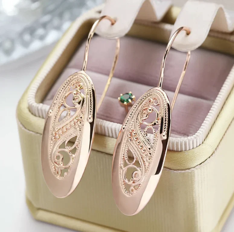 Modern Hollow Gold Drop Earrings - Image 2