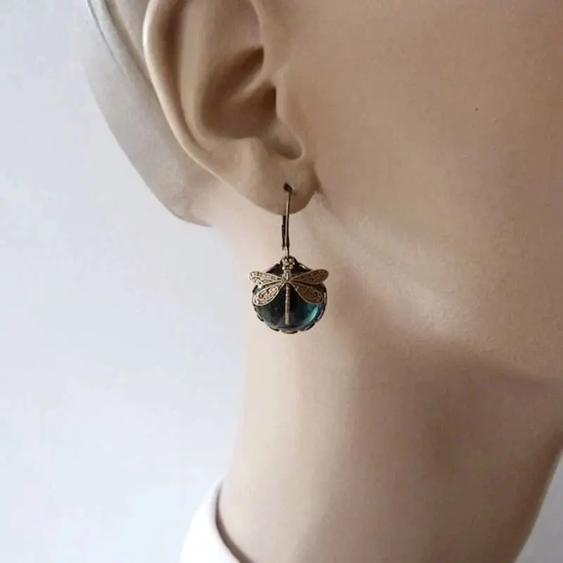 Spherical dragonfly earrings in antique gold - Image 3